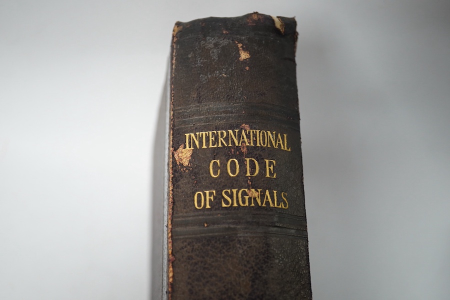 The International Code of Signals for the Use of All Nations. (revised edition). num. coloured illus. of flags (etc.) on 8 plates, and with semaphore / more b/w. illus.; original morocco backed cloth, 4to. published for